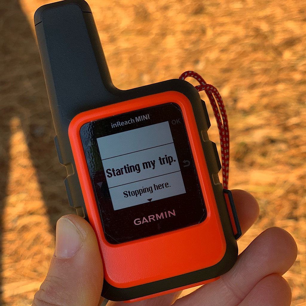 The Blissful Hiker sets her Garmin inReach GPS to "starting my trip." 