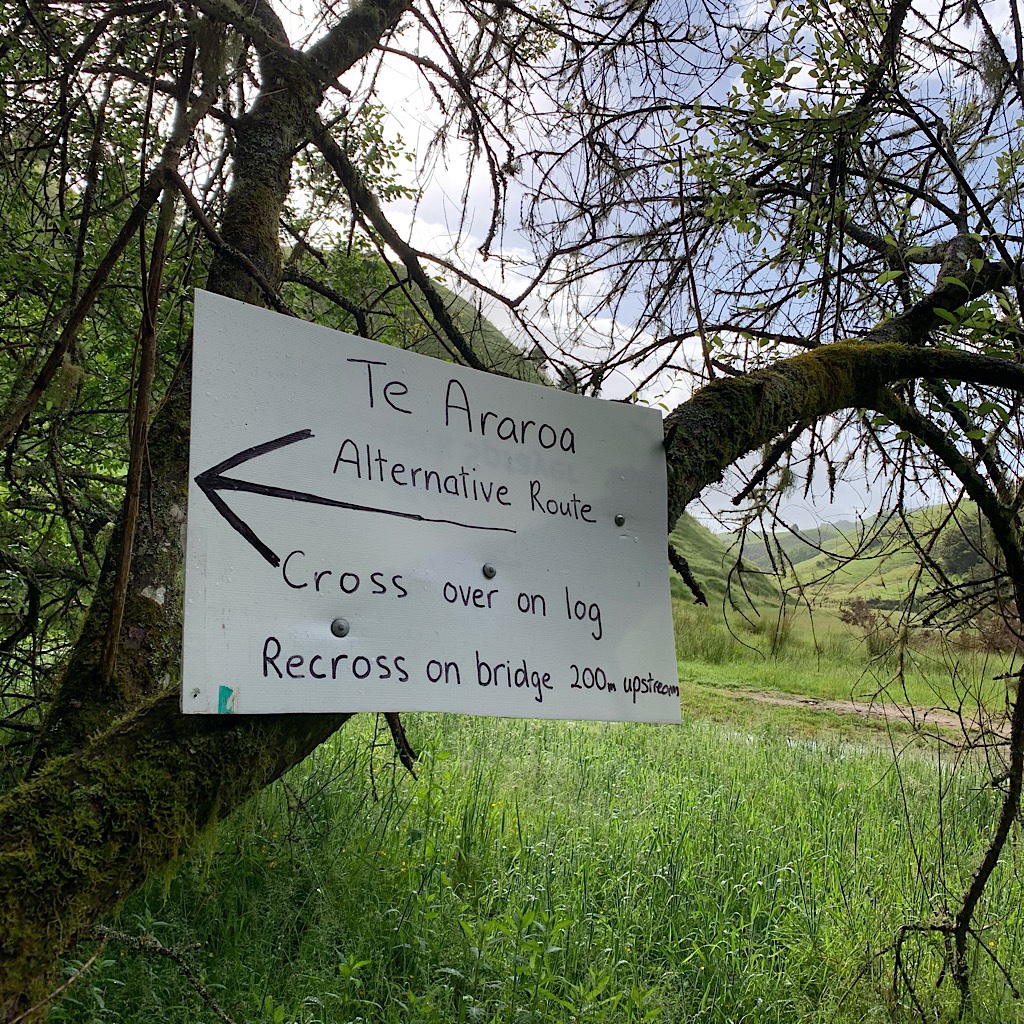 A very kind farmer leaves a sign when the crossing and the surrounding river bank is impassible. 