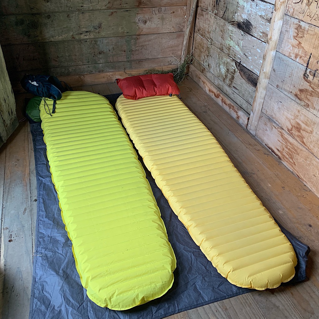Chloe's and my mattresses in the tight fit of the wee shelter at No. 10 Camp before I changed my mind and set up my tent outside. 