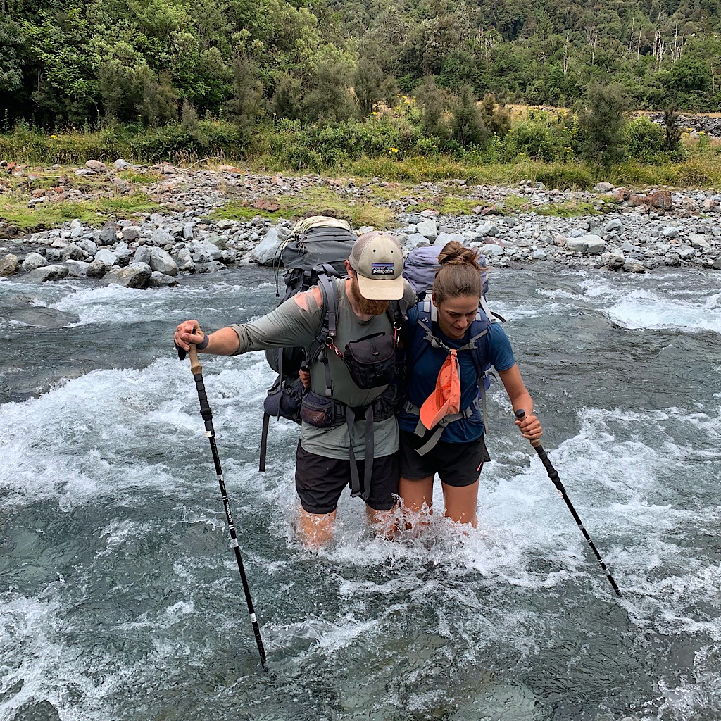 Trampers assume the crablike walk in the deep, rushing and cold water. Most injuries on New Zealand tracks are from falling, not overuse. 