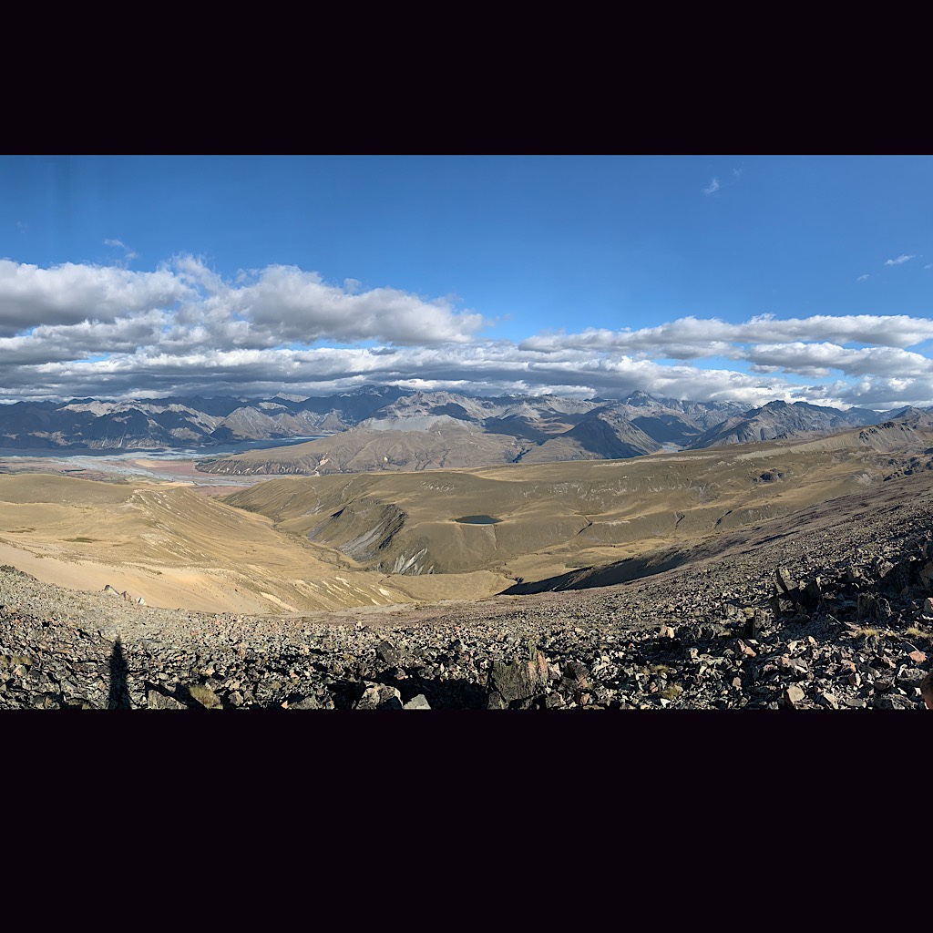 A panorama from the summit. Tomaš spoke on the phone to his sister while we took in the view. 