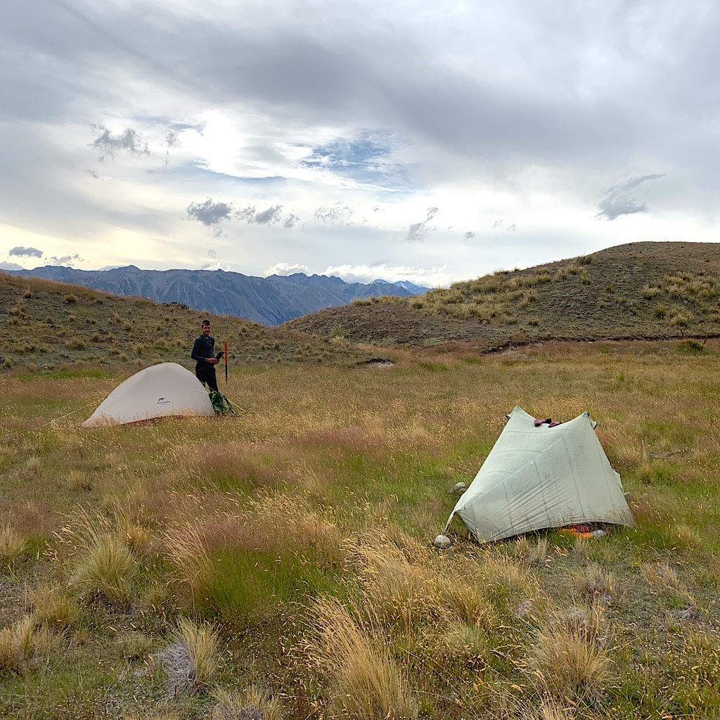 Tents in the tussock. There was a rushing stream nearby and utter solitude. 