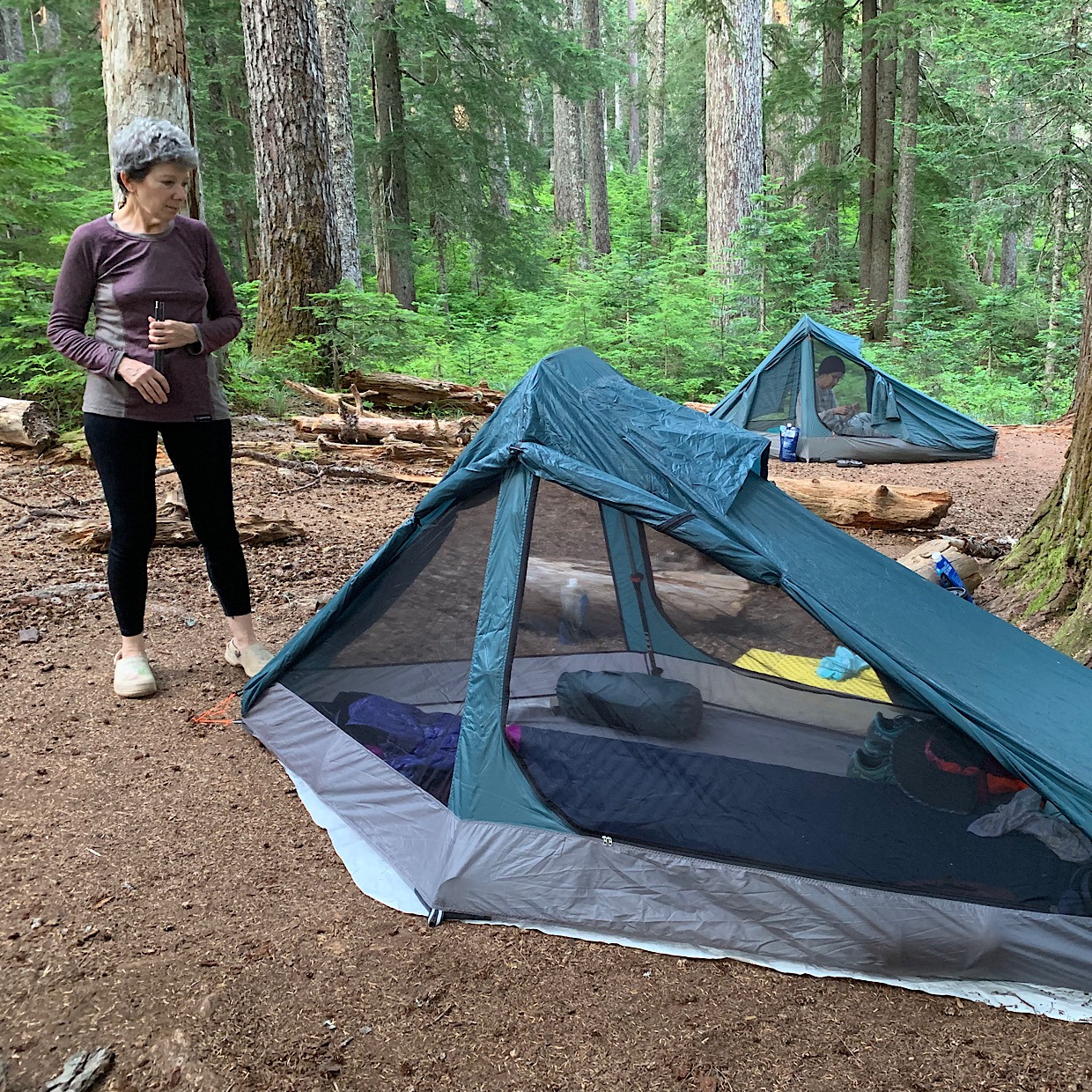 Judy met a guy with a much lighter tent while hiking the Appalachian Trail and it was not a "coffin" but rather, a palace. That just pissed her off, so she went designed her own ultralight palace.